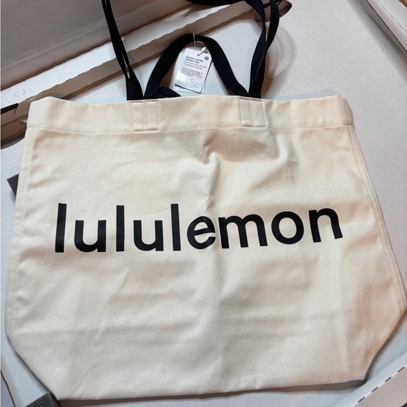 Lululemon Double Handle Canvas Snap Closure Tote Bag Natural/Black NWT - Picture 1 of 9